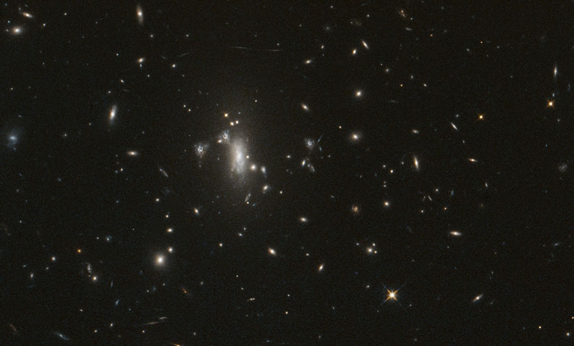 Hubble Reaches 200,000 Orbits While Hunting Lensed Supernova